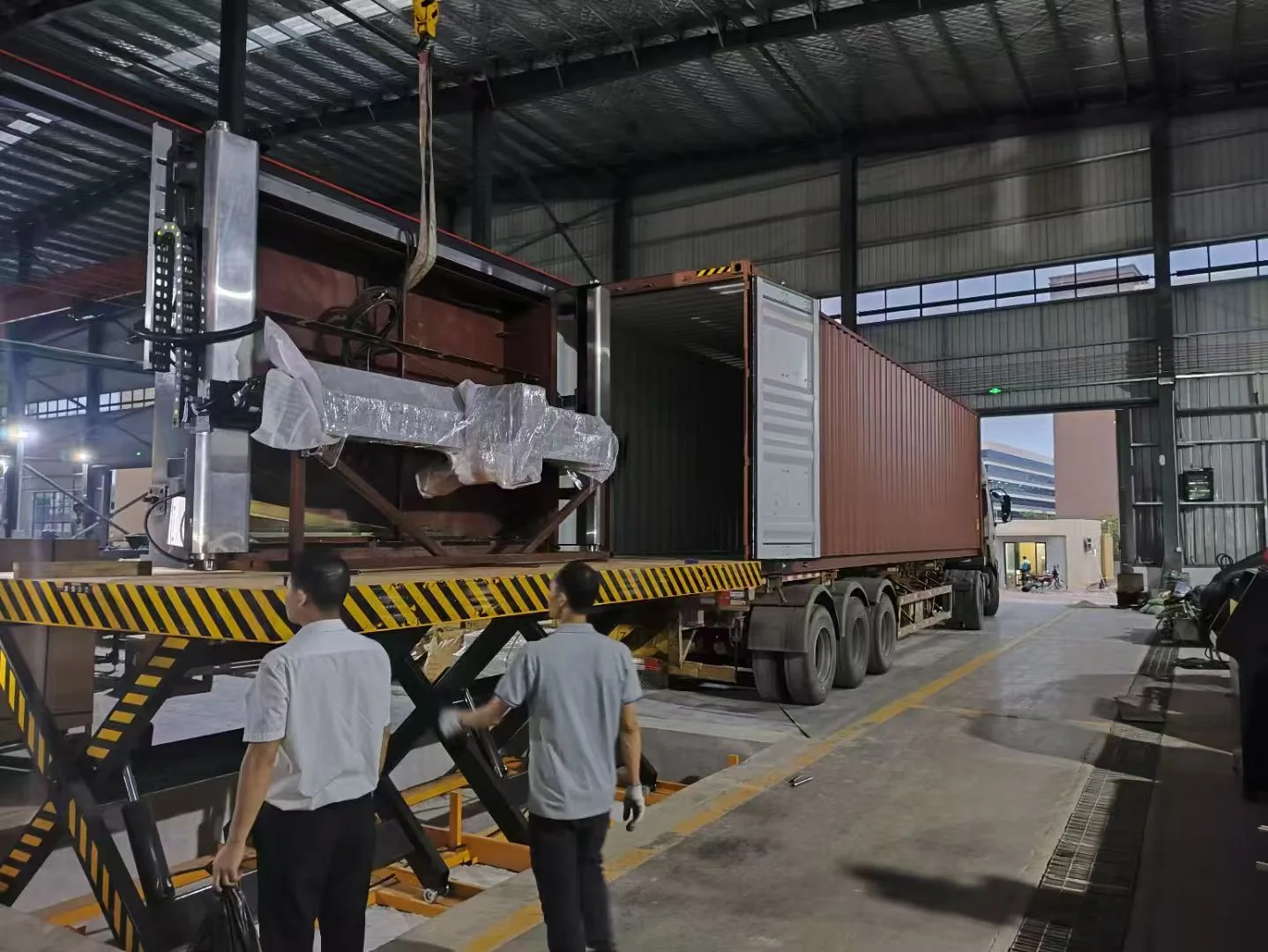 Waterjet bridge section wrapped and loaded into the container